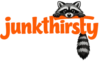 Raccoon peeking over orange "junkthirsty" text